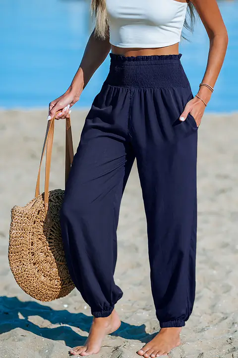 Pantalon bleu jambe fuselée taille smockée